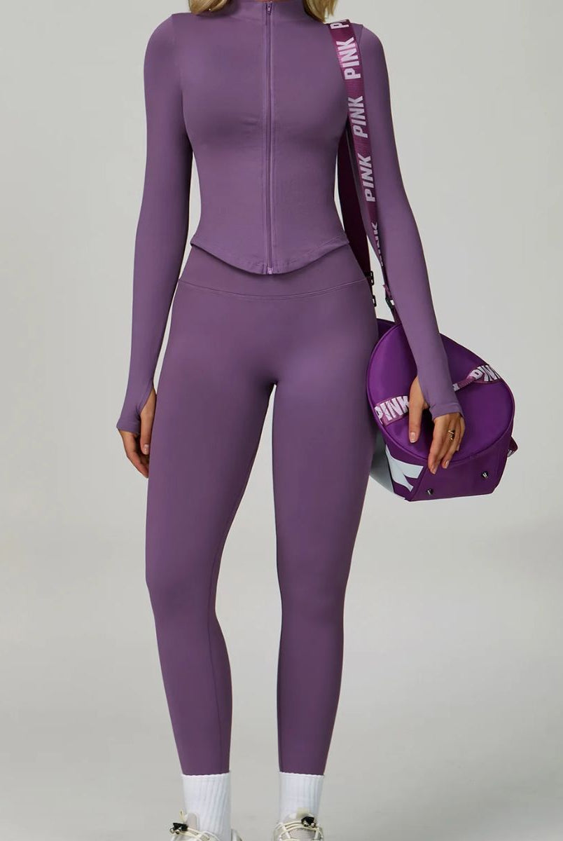 Model wearing the Purple ContourFlex Three-Piece Set with top, jacket and leggings in a front-facing standing pose.