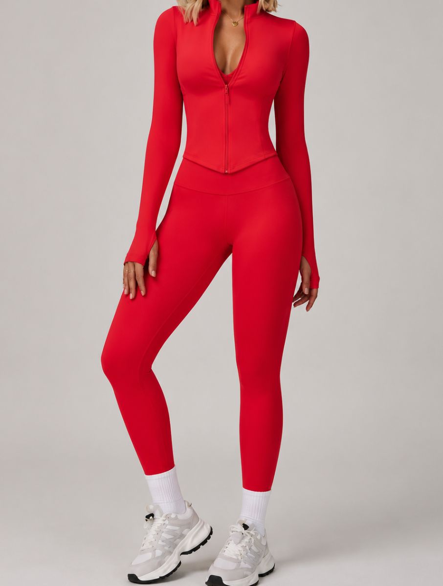 Model wearing the Red ContourFlex Three-Piece Set with top, jacket and leggings in a front-facing standing pose.