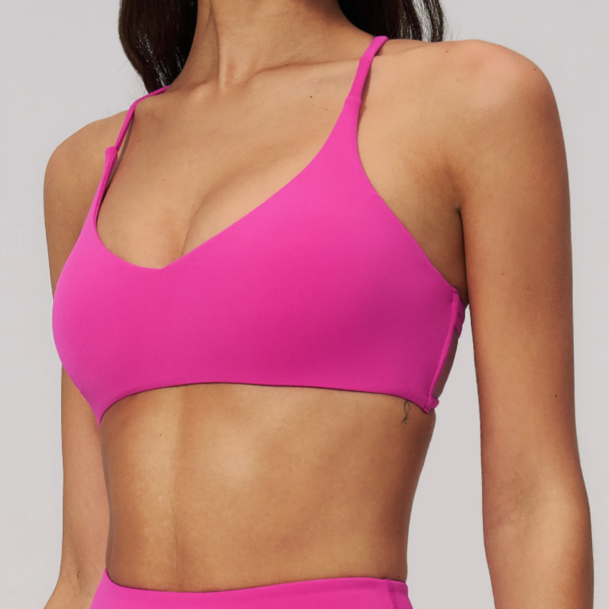 Elara Cross-Back Bra in Magenta side view