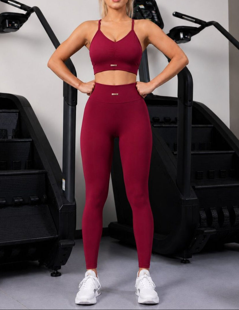 Seamless Hip-Lifting Yoga Set in Encore Red, shown in a front pose with a sculpting fit.