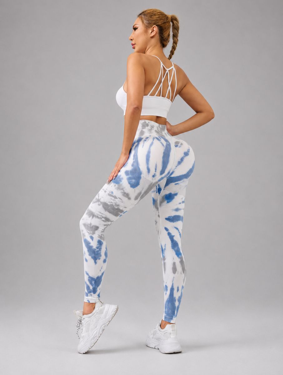 Seamless Tie-Dye Scrunch Leggings in blue, shown in a back angle pose with a tie-dye pattern.