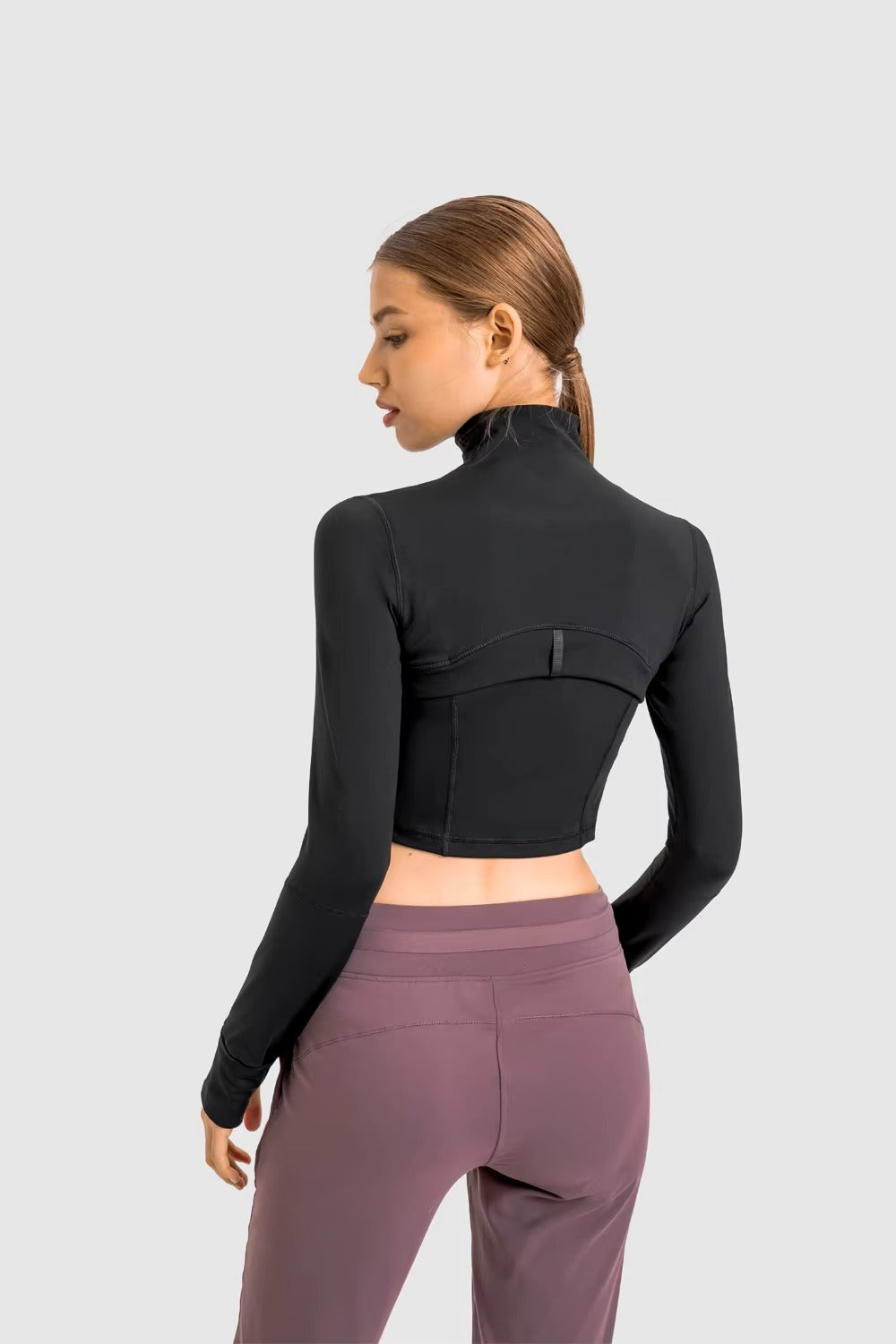 Flowline Zip-Up Cropped Jacket in Black – Model View | Starlethics Activewear