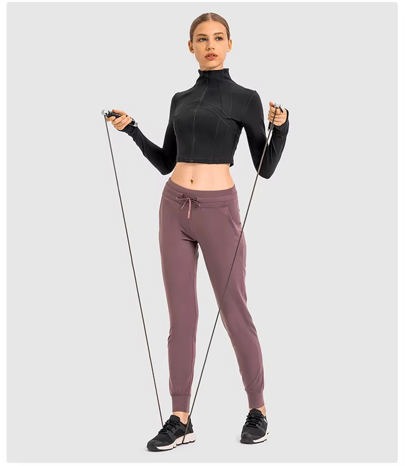 Flowline Zip-Up Cropped Jacket in Black – Model View | Starlethics Activewear