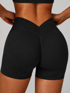 Back view of the ContourFlex Three-Piece Set shorts in black, showing the high-waisted design and body-contouring fit.