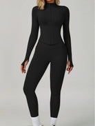 Model wearing the Black ContourFlex Three-Piece Set with top, jacket and leggings in a front-facing standing pose.