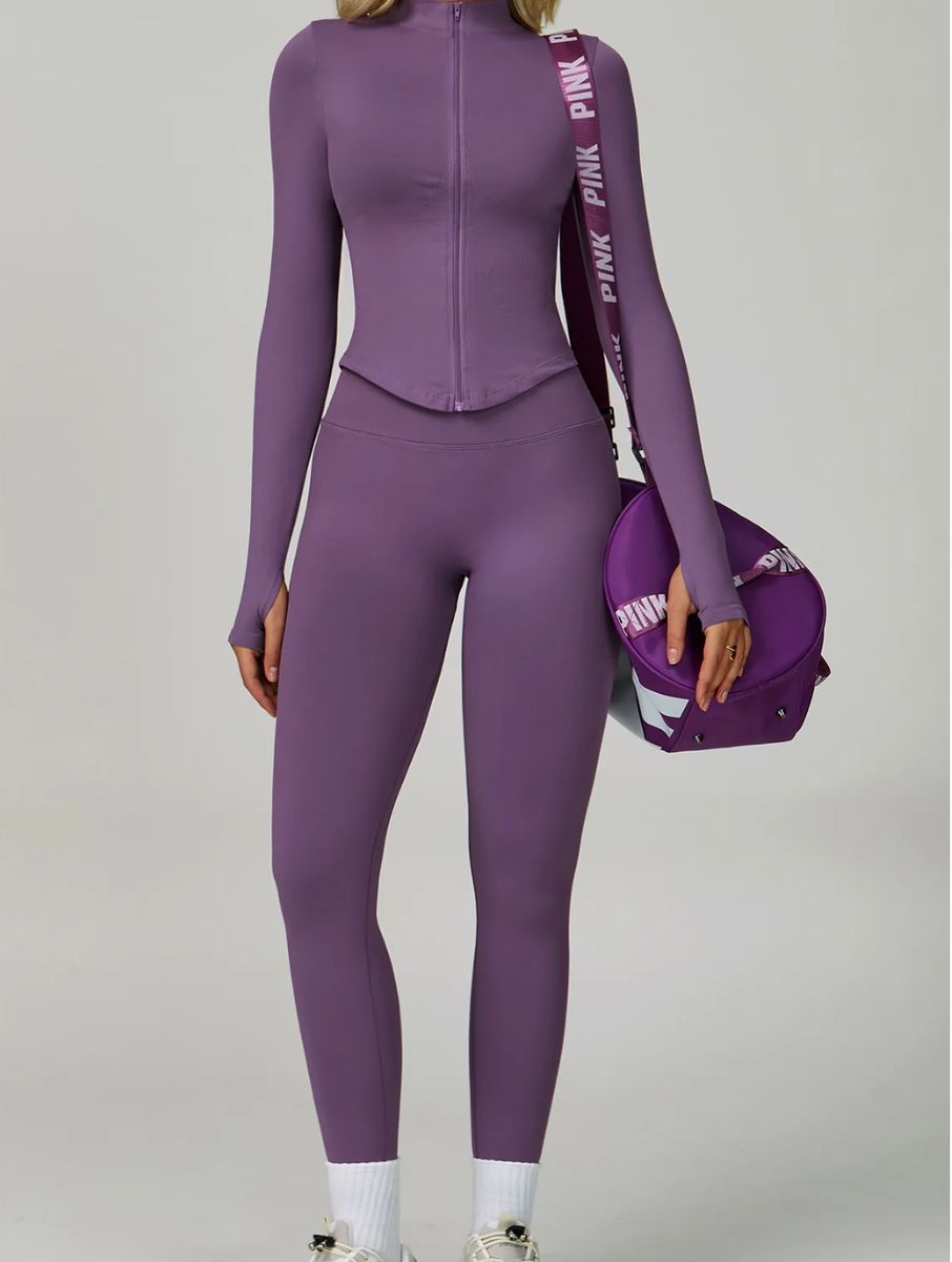 Model wearing the Purple ContourFlex Three-Piece Set with top, jacket and leggings in a front-facing standing pose.