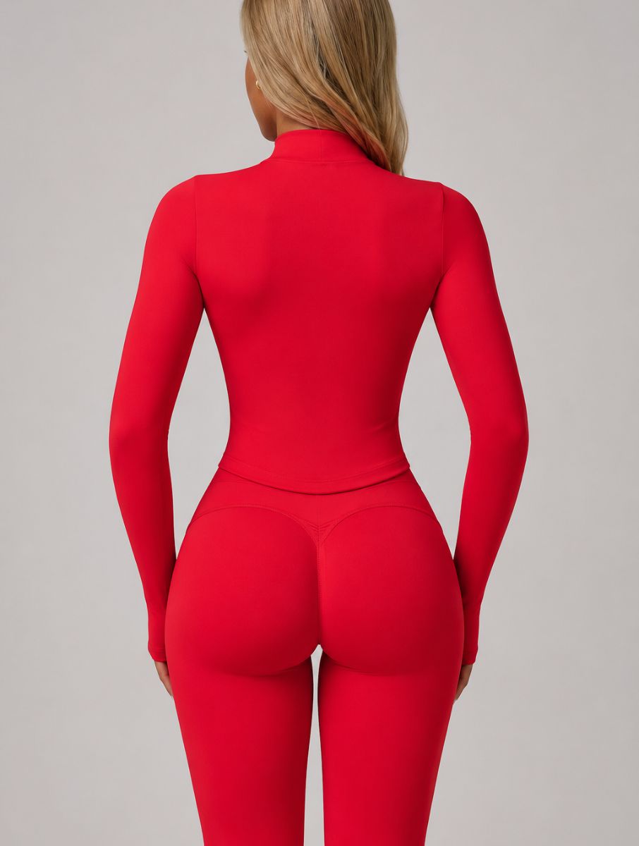 Model wearing the Red ContourFlex Three-Piece Set with top, jacket and leggings in a back-view pose.