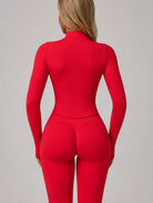 Model wearing the Red ContourFlex Three-Piece Set with top, jacket and leggings in a back-view pose.