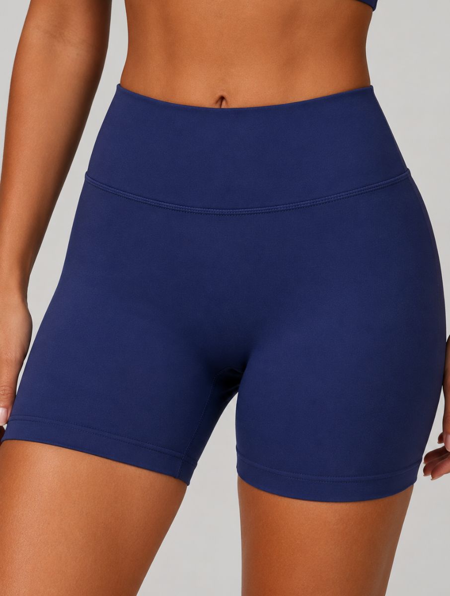 Close-up front view of the ContourFlex Seamless shorts in Navy Blue, shown in a front-detail pose.
