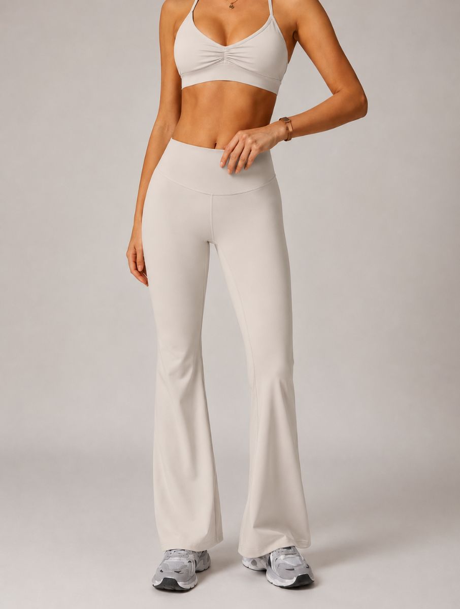 High-Waist Flared Yoga Leggings in grey apricot, shown in a front pose with a flared-leg design.
