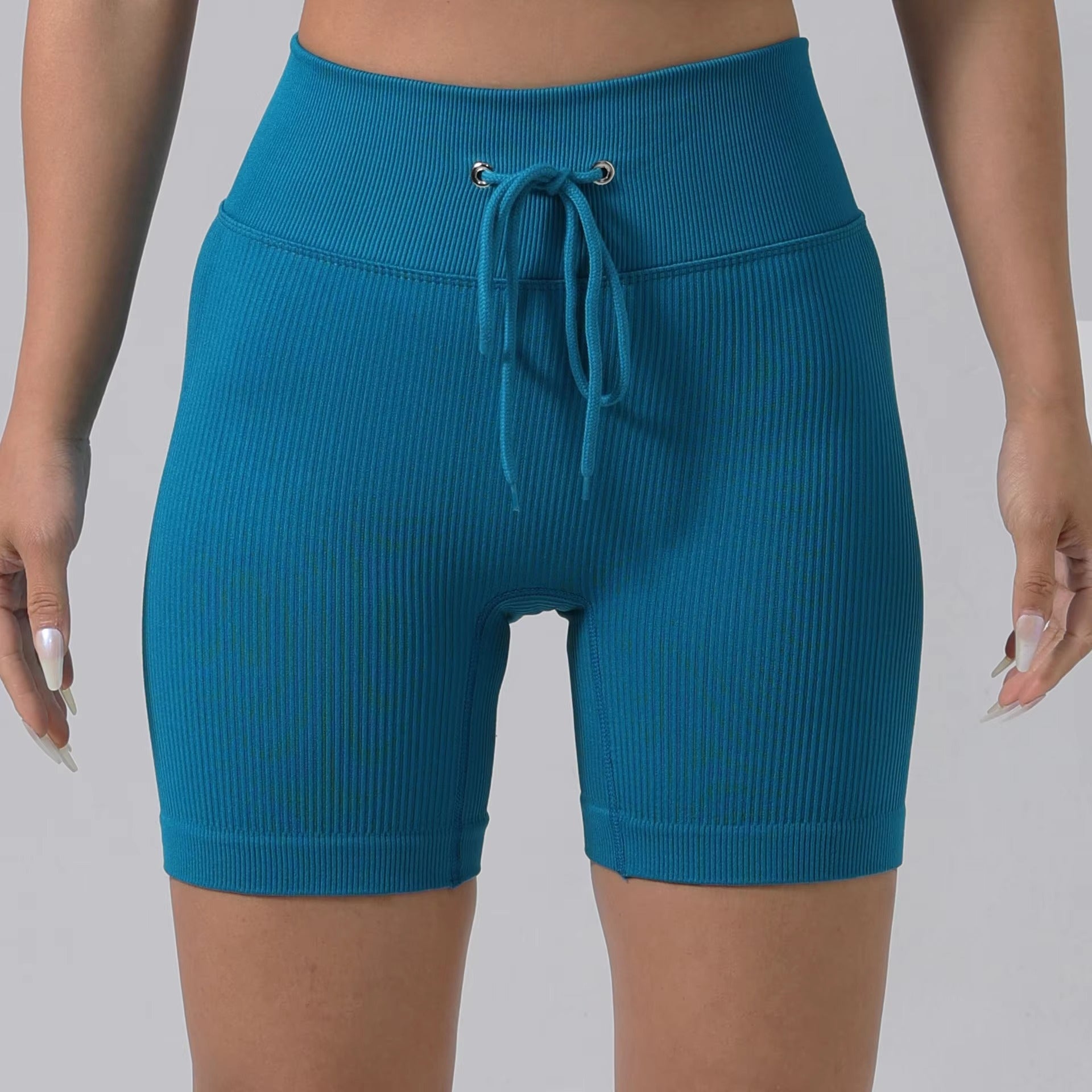 Piper Ribbed String Shorts – Model View 1 | Starlethics Activewear