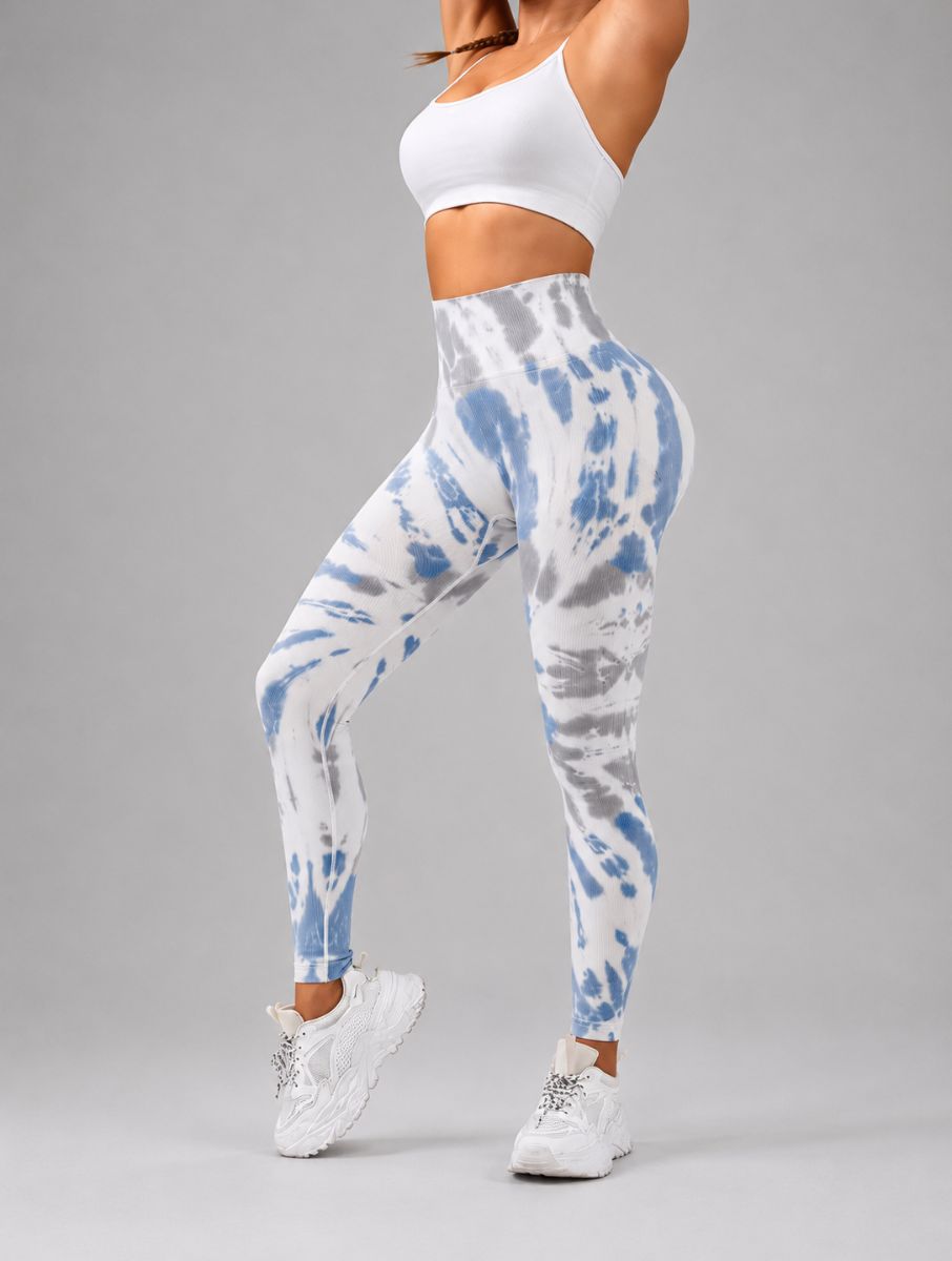 Seamless Tie-Dye Scrunch Leggings in blue, shown in a side pose with a tie-dye pattern.
