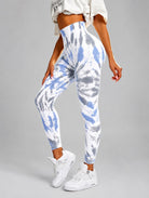 Seamless Tie-Dye Scrunch Leggings in blue, shown in a side pose with a tie-dye pattern.
