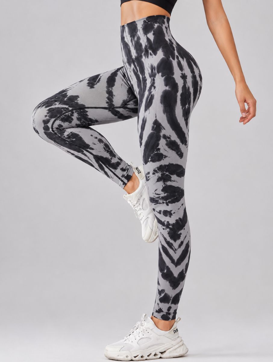 Seamless Tie-Dye Scrunch Leggings in grey, shown in a side pose with a tie-dye pattern.
