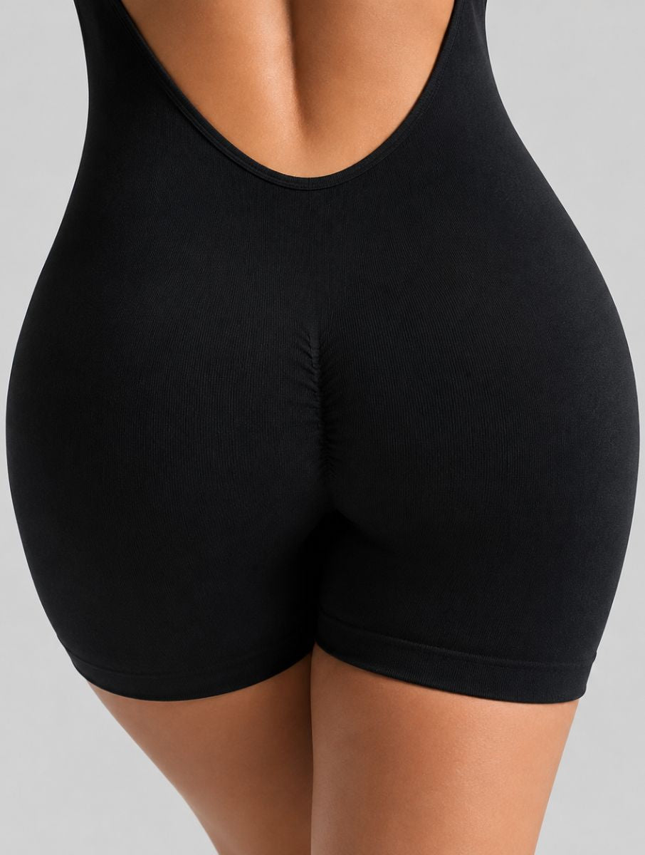 Veloura Seamless Sculpt Jumpsuit in black, shown in a back detail pose highlighting the sculpting fit.